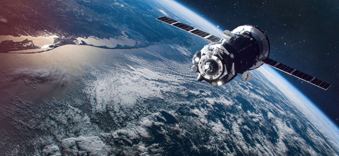 Spaceship on orbit of the Earth planet. Dark space. Elements of this image furnished by NASA